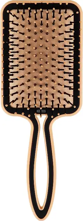 Rectangular peach-colored hairbrush with massaging bristles